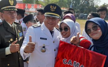 Camat Sukatani Agus Dahlan Pimpim Langsung Upacara Peringatan HUT RI Yang ke 78 Sekaligus Merayakan HUT Camat Yang ke 49 di lapangan Stadion Mini Sukatani